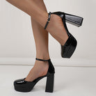 Mescini - black block heel platform pumps on model, side profile of the squared heel