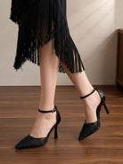 Mescini black embroidered mesh ankle strap pumps, standing pair on a wood floor, US women's sizes