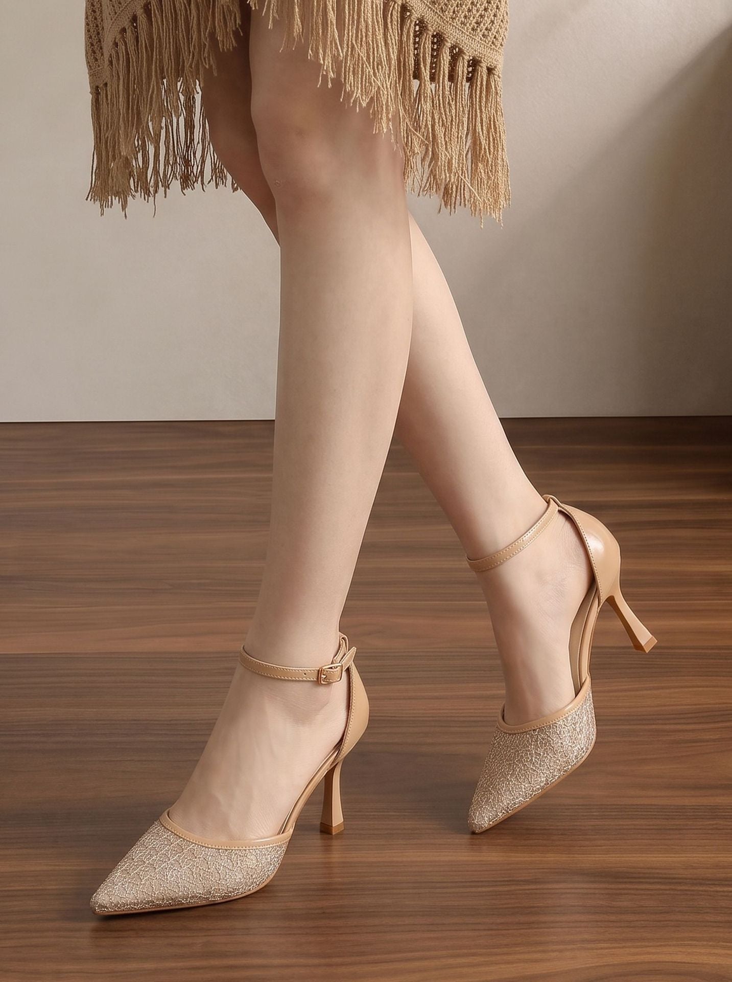 Mescini apricot embroidered mesh ankle strap pumps, mid stride on a wood floor, US women's sizes