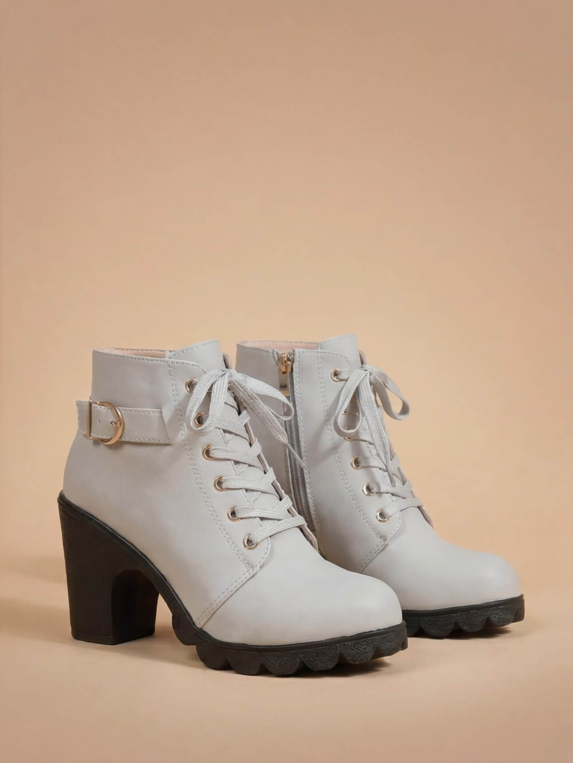 Mescini grey lace up combat ankle boots with buckle strap and lug sole, angled pair view