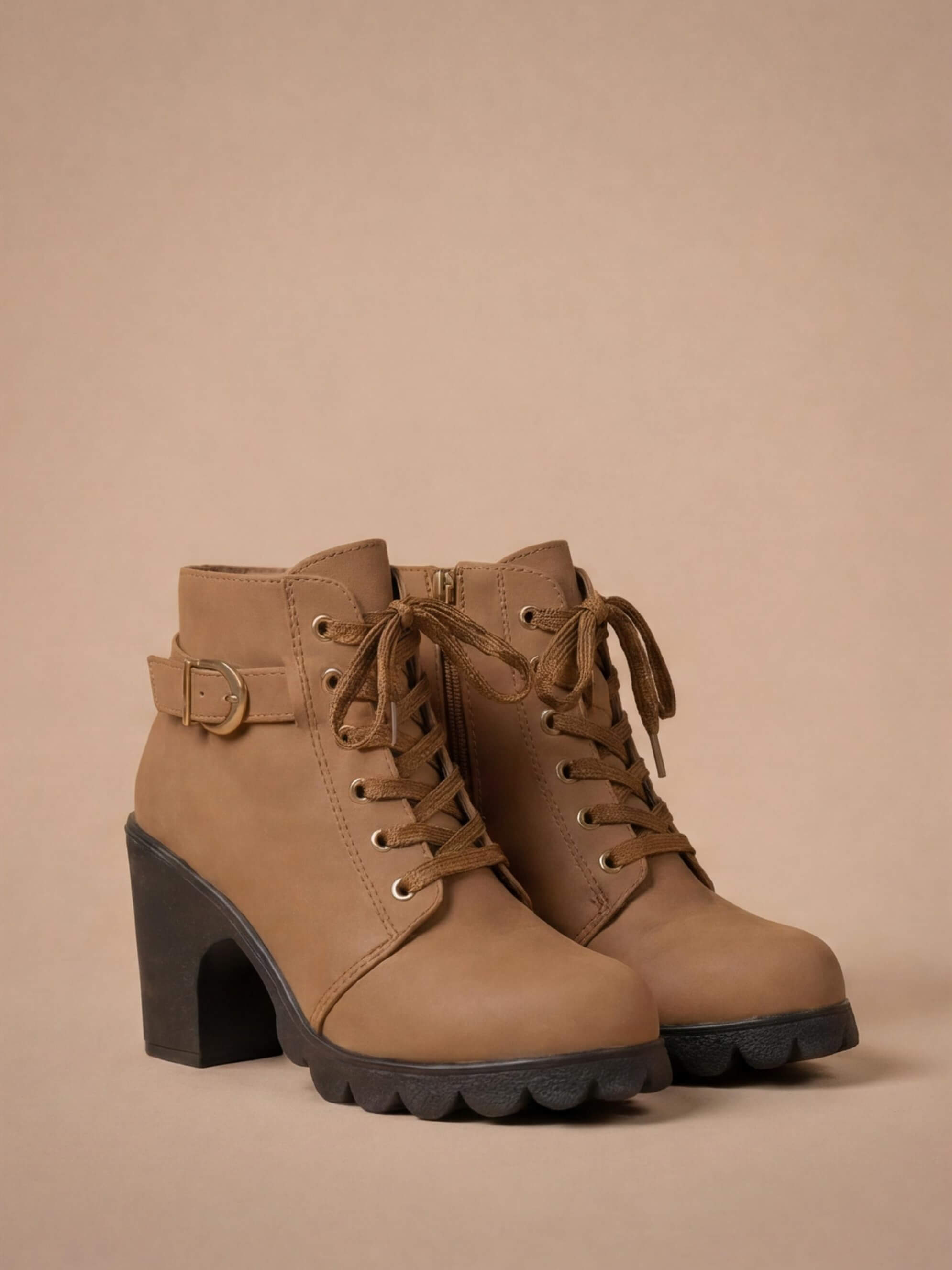 Mescini brown lace up combat ankle boots with buckle strap and lug sole, angled pair view