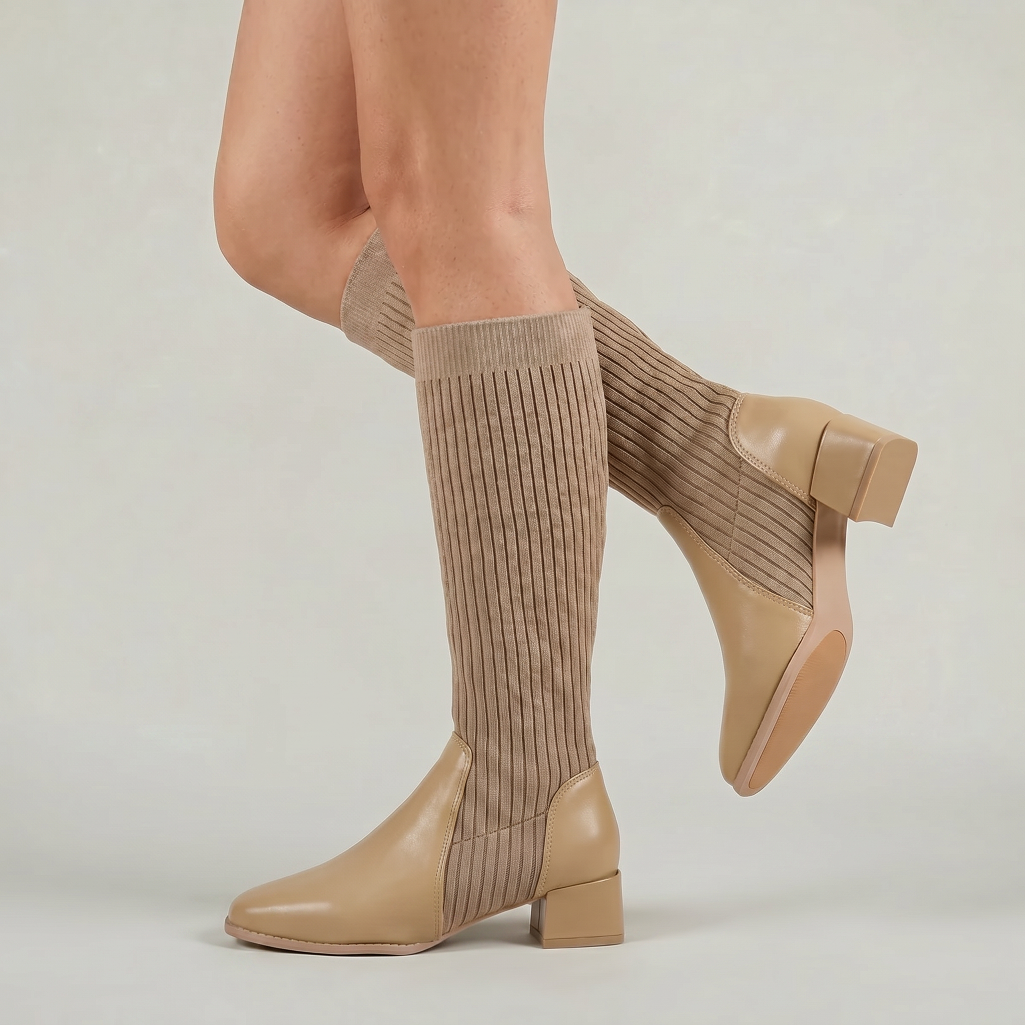 Mescini - khaki knit knee high boots on the model, shaft creased at the ankle, US women's sizes