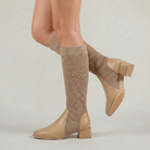 Mescini - khaki knit knee high boots on the model, shaft creased at the ankle, US women's sizes