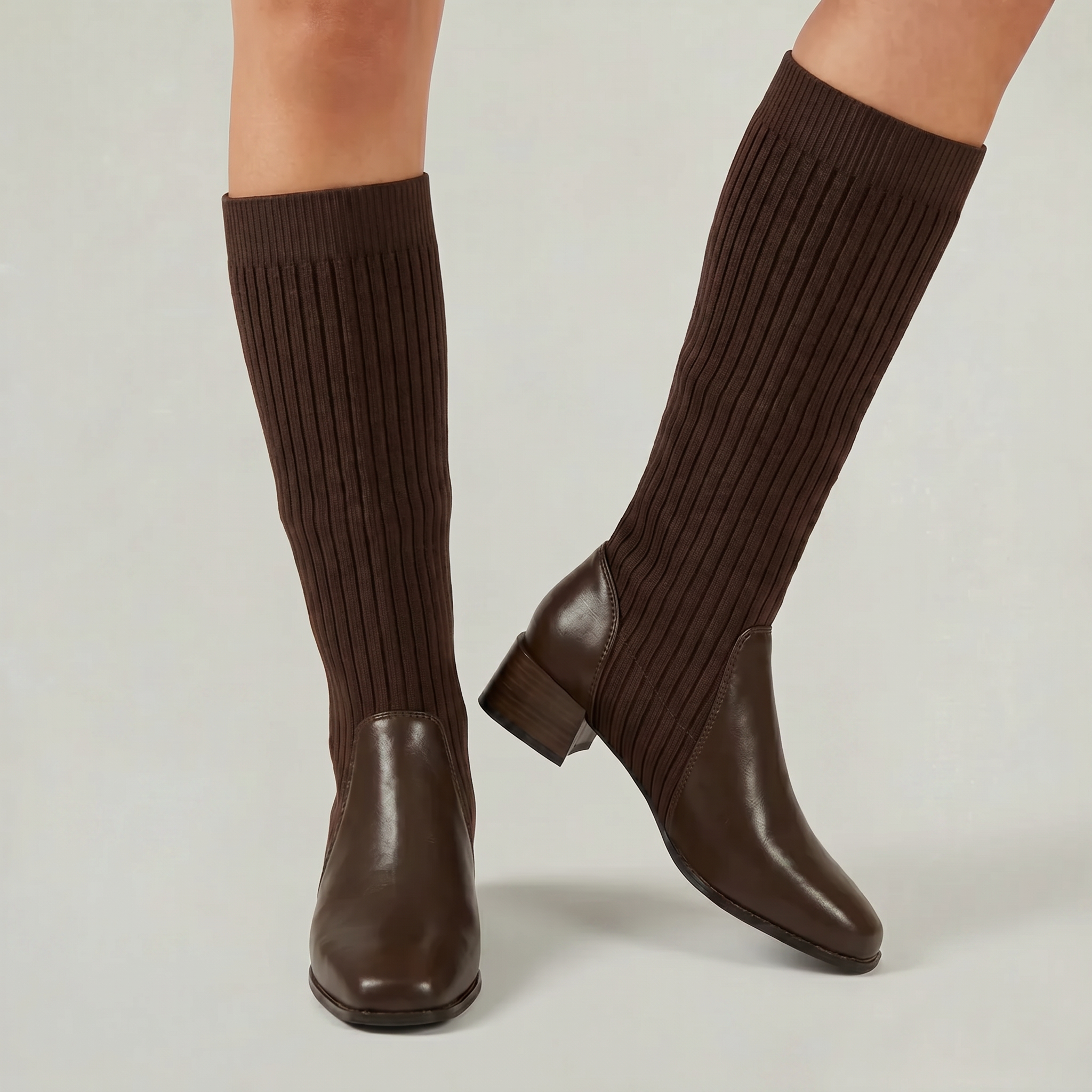 Mescini - dark brown knit knee high boots on the model, walking pose, US women's sizes