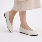 Mescini - off-white ballet flats worn, seam running to the toe, US women's sizes