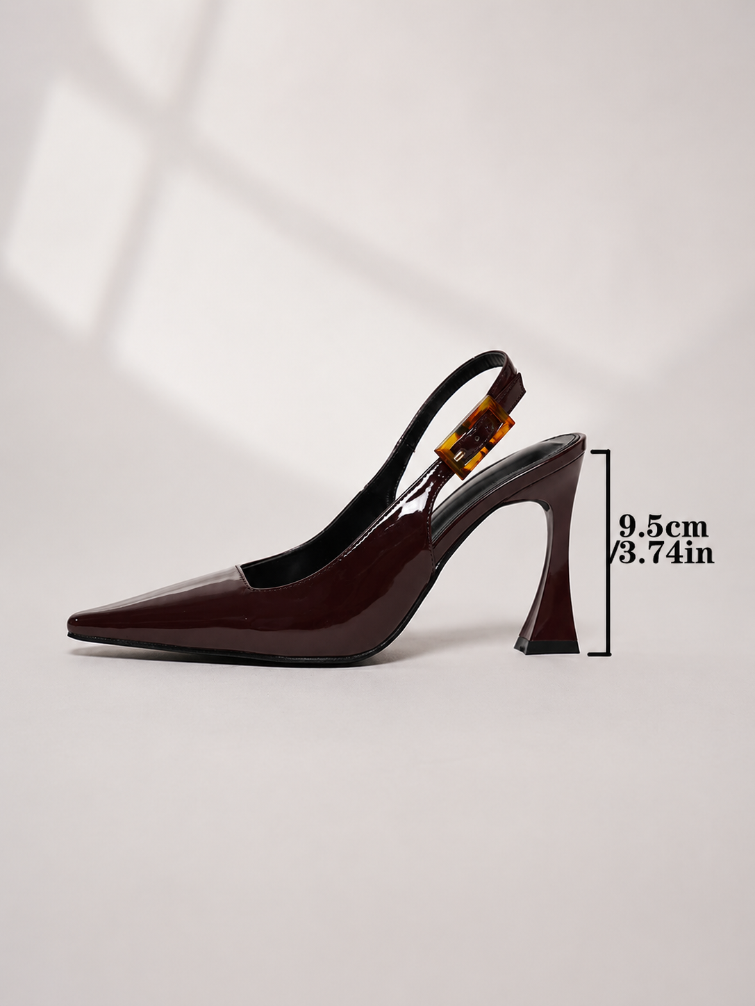 Mescini burgundy pointed toe patent slingback pumps with the 9.5 cm heel marked, US women's sizes