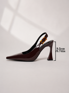 Mescini burgundy pointed toe patent slingback pumps with the 9.5 cm heel marked, US women's sizes