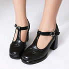 Mescini - black t strap brogue platform mary jane heels on a model, front view, US women's sizes