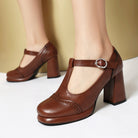 Mescini - brown t strap brogue platform mary jane heels worn on a model, US women's sizes