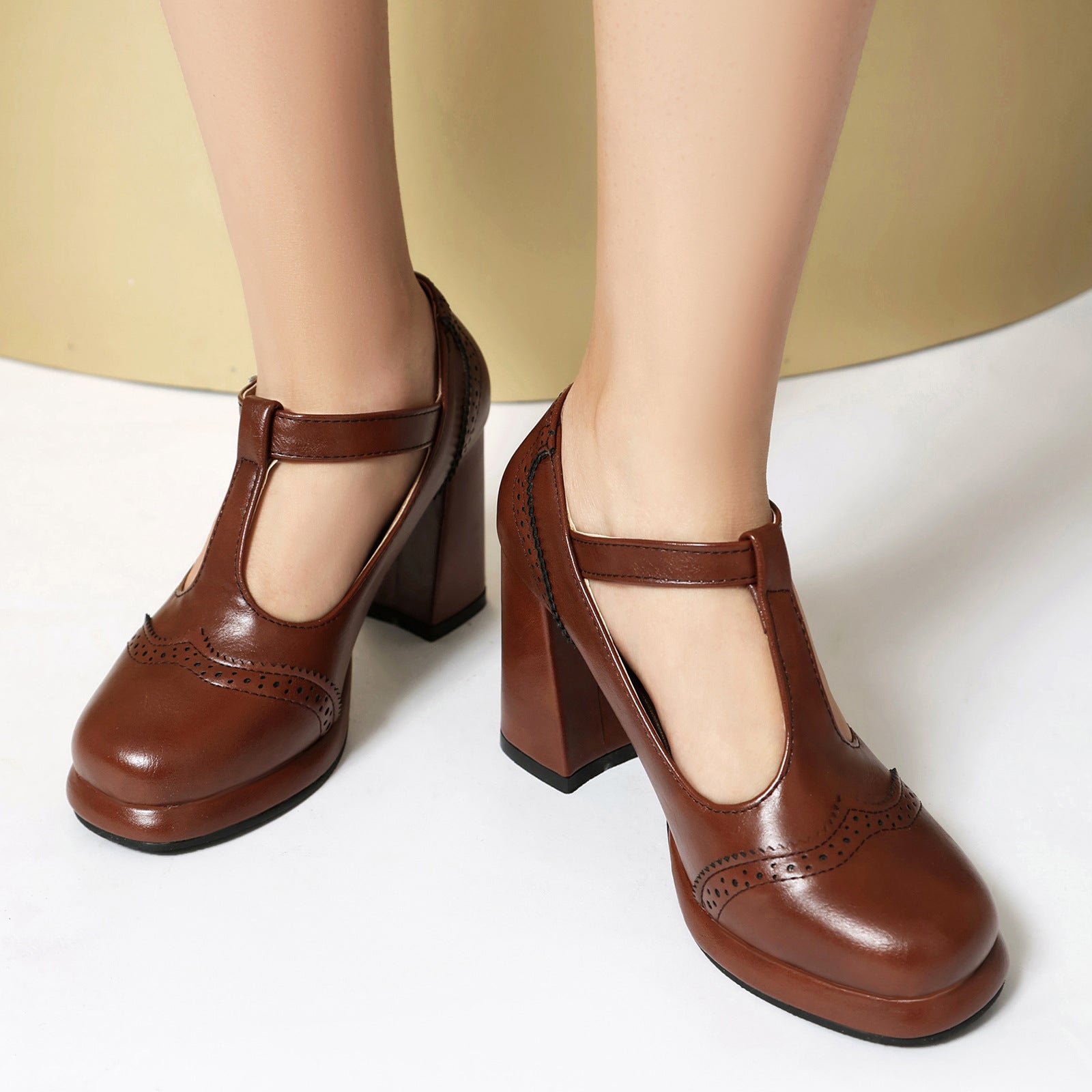 Mescini - brown t strap brogue mary jane heels, punched toe cap close up, US women's sizes