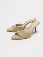 Mescini beige pointed open toe suede stiletto mules, the pair angled on white, US women's sizes