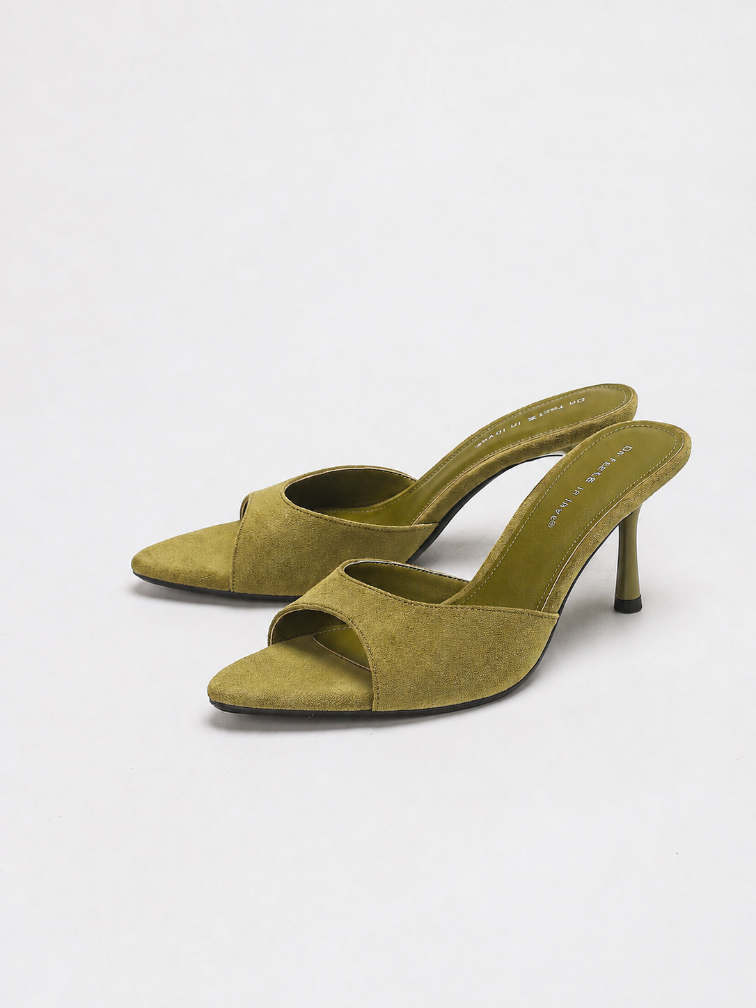 Mescini green pointed open toe suede stiletto mules, the pair angled on white, US women's sizes