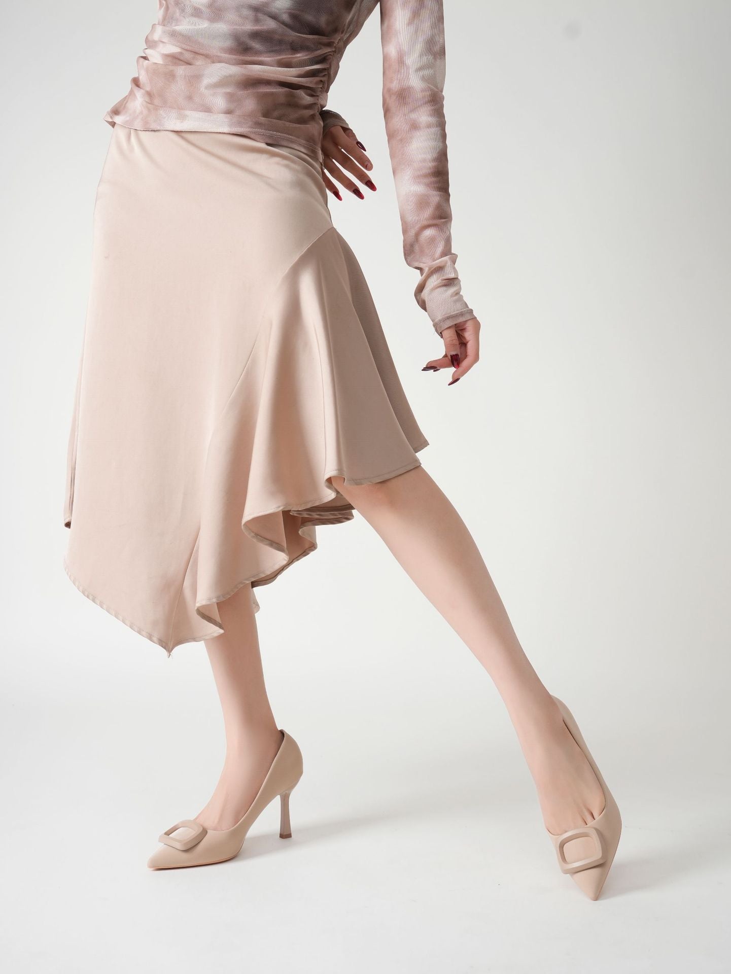 Mescini beige square ring pointed toe pumps seen from behind while walking, US women's sizes