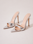 Mescini silver croc embossed pointed stiletto mules, pair placed together in the studio, US women's sizes