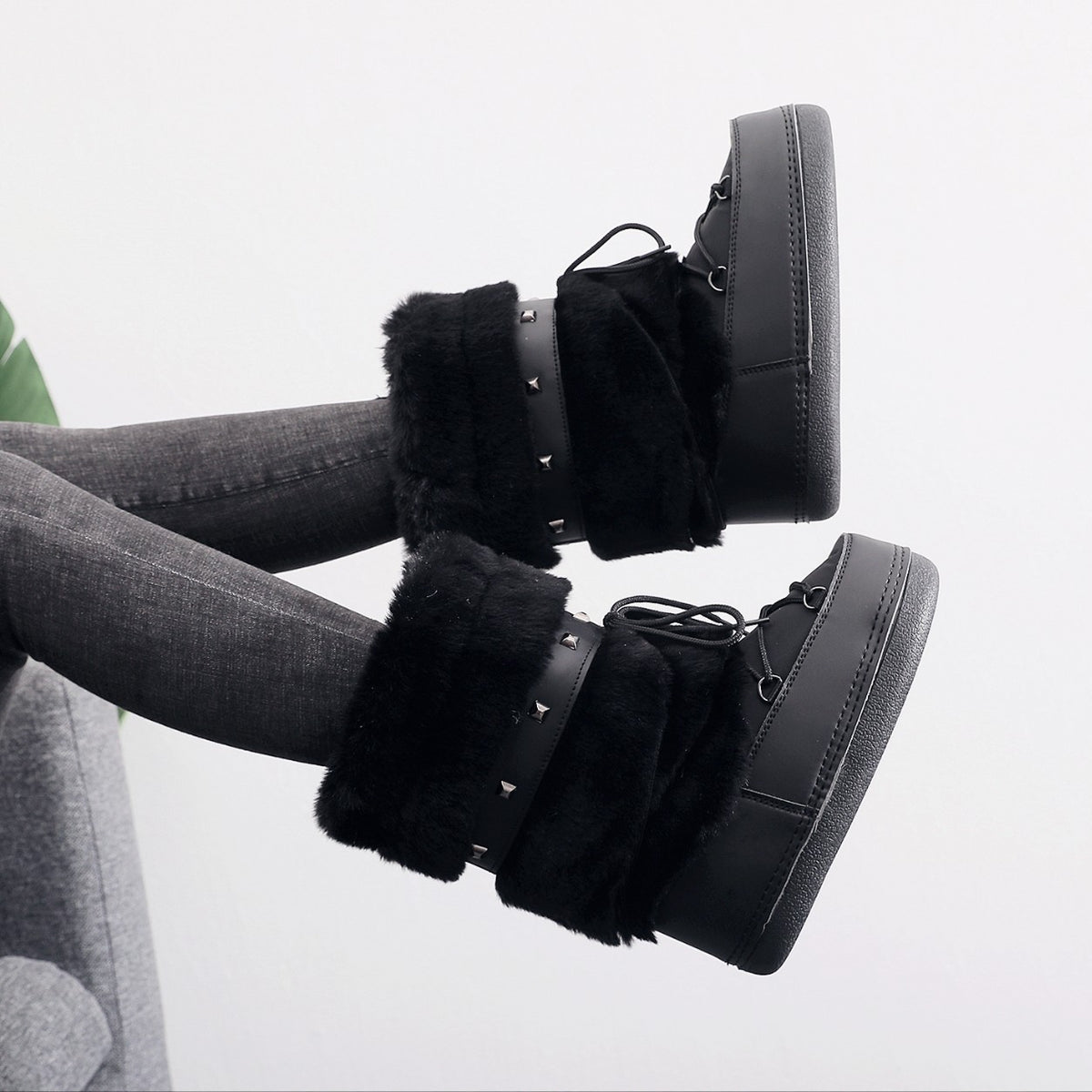 Mescini - black faux fur snow boots worn with grey jeans, lifestyle shot, US women's sizes