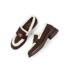 Mescini brown faux shearling trim loafers with gold turnlock strap, angled pair view
