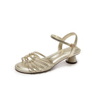 Mescini – gold woven heeled sandal, single shoe studio view on white, US women's sizes