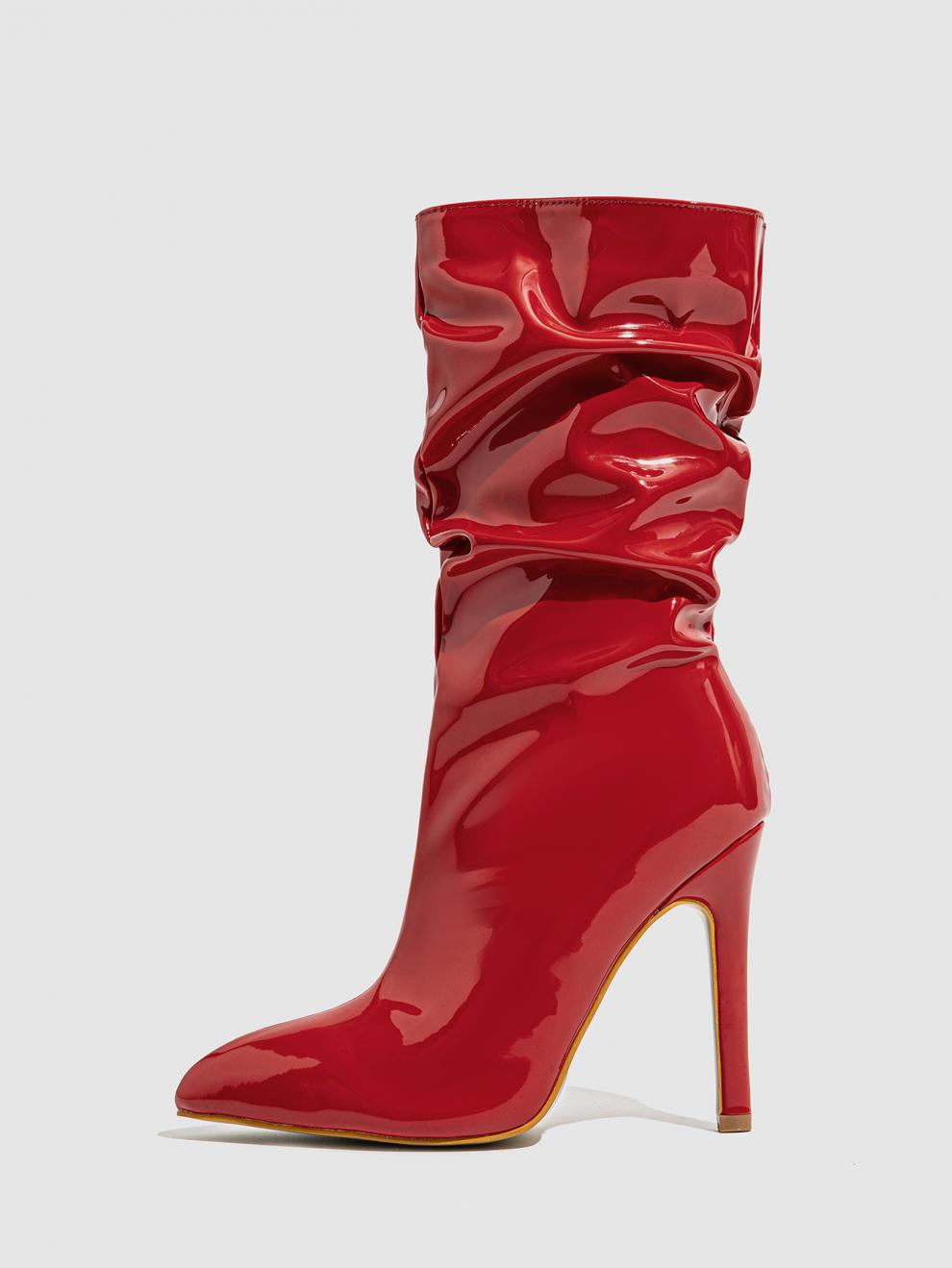 Mescini red slouchy patent mid calf boots, one shoe standing upright on grey, US women's sizes