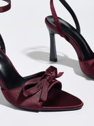 Mescini burgundy satin bow ankle strap sandals, close up of the knot at the pointed toe, US women's sizes