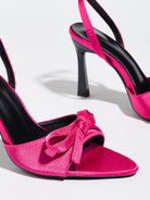 Mescini pink satin bow ankle strap sandals, close up of the knot and the pointed toe, US women's sizes