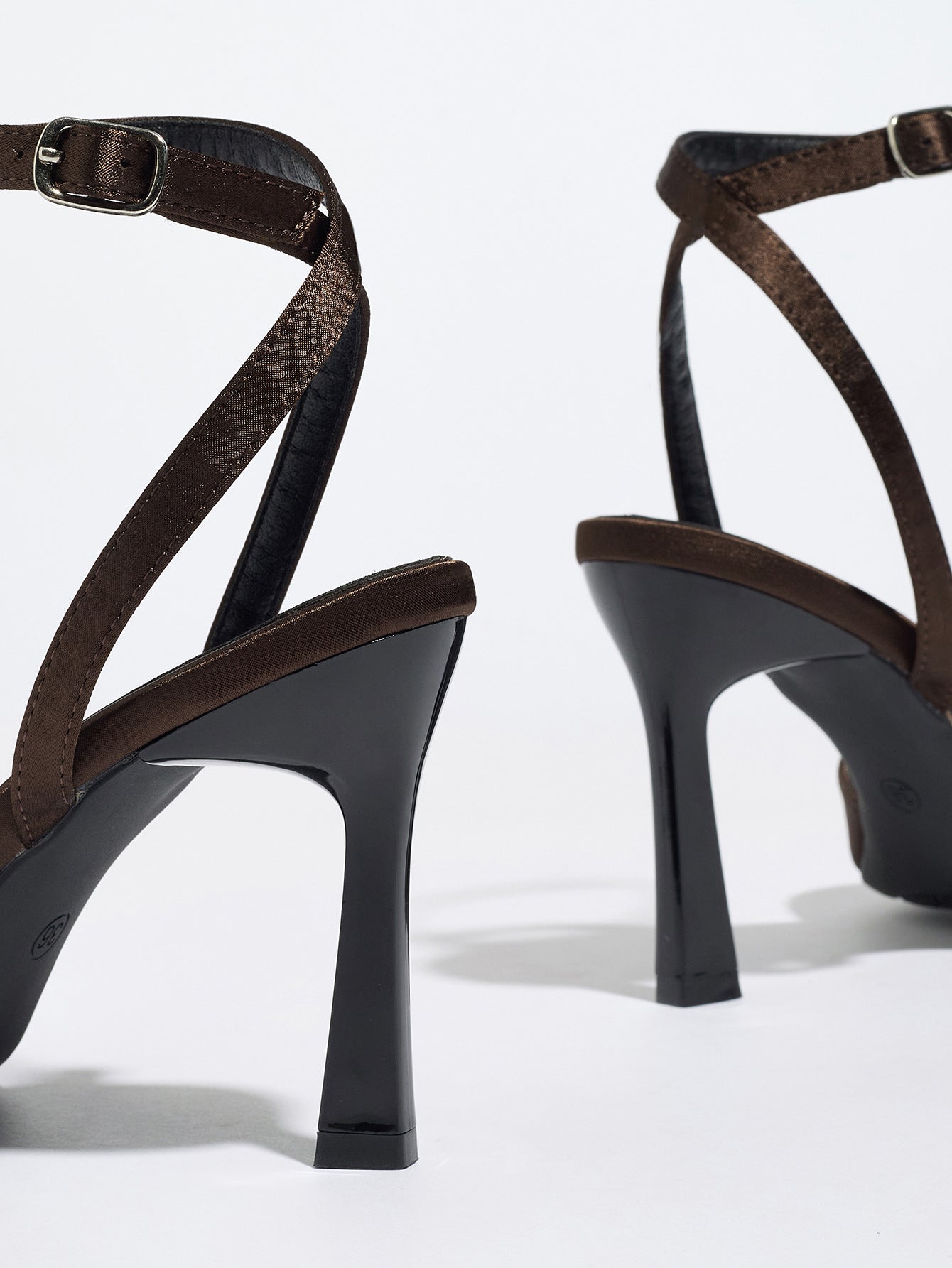 Mescini brown satin bow ankle strap sandals, rear view of the pair, heels turned outward, US women's sizes