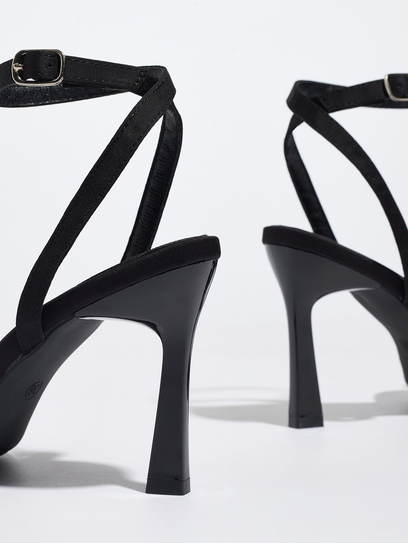 Mescini black satin bow ankle strap sandals, rear view of the pair showing the heels, US women's sizes