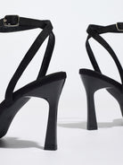 Mescini black satin bow ankle strap sandals, rear view of the pair showing the heels, US women's sizes