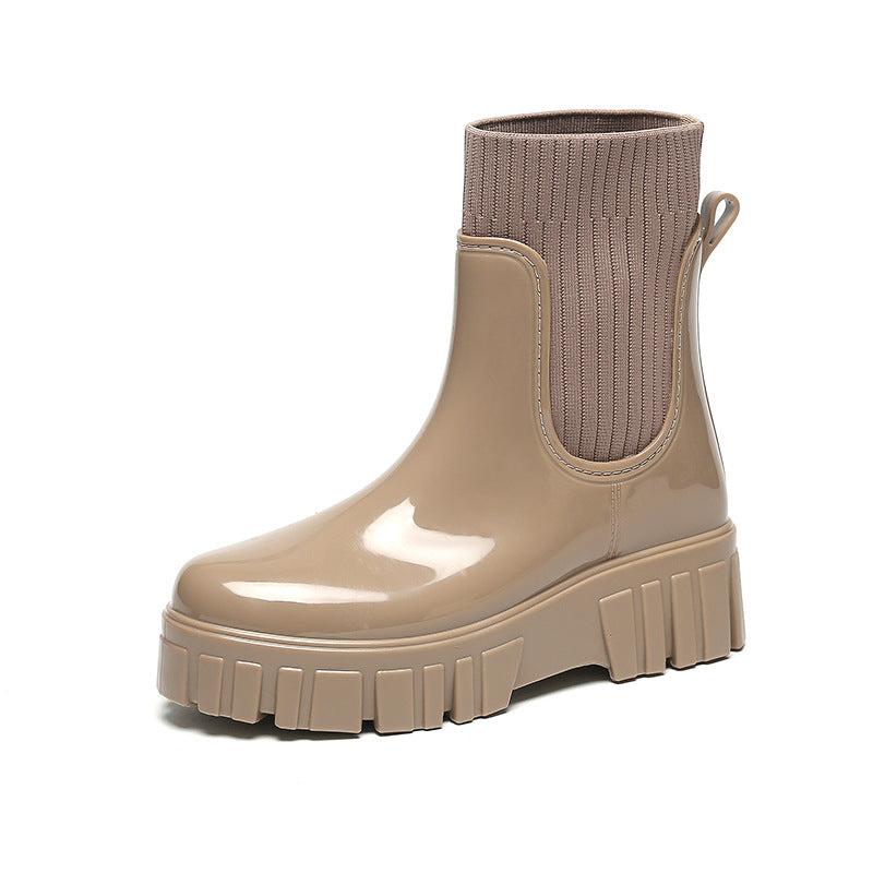 Mescini khaki glossy platform chelsea rain boots, single shoe on a plain ground, US women's sizes