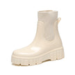 Mescini ivory glossy platform chelsea rain boots, single shoe on a plain ground, US women's sizes