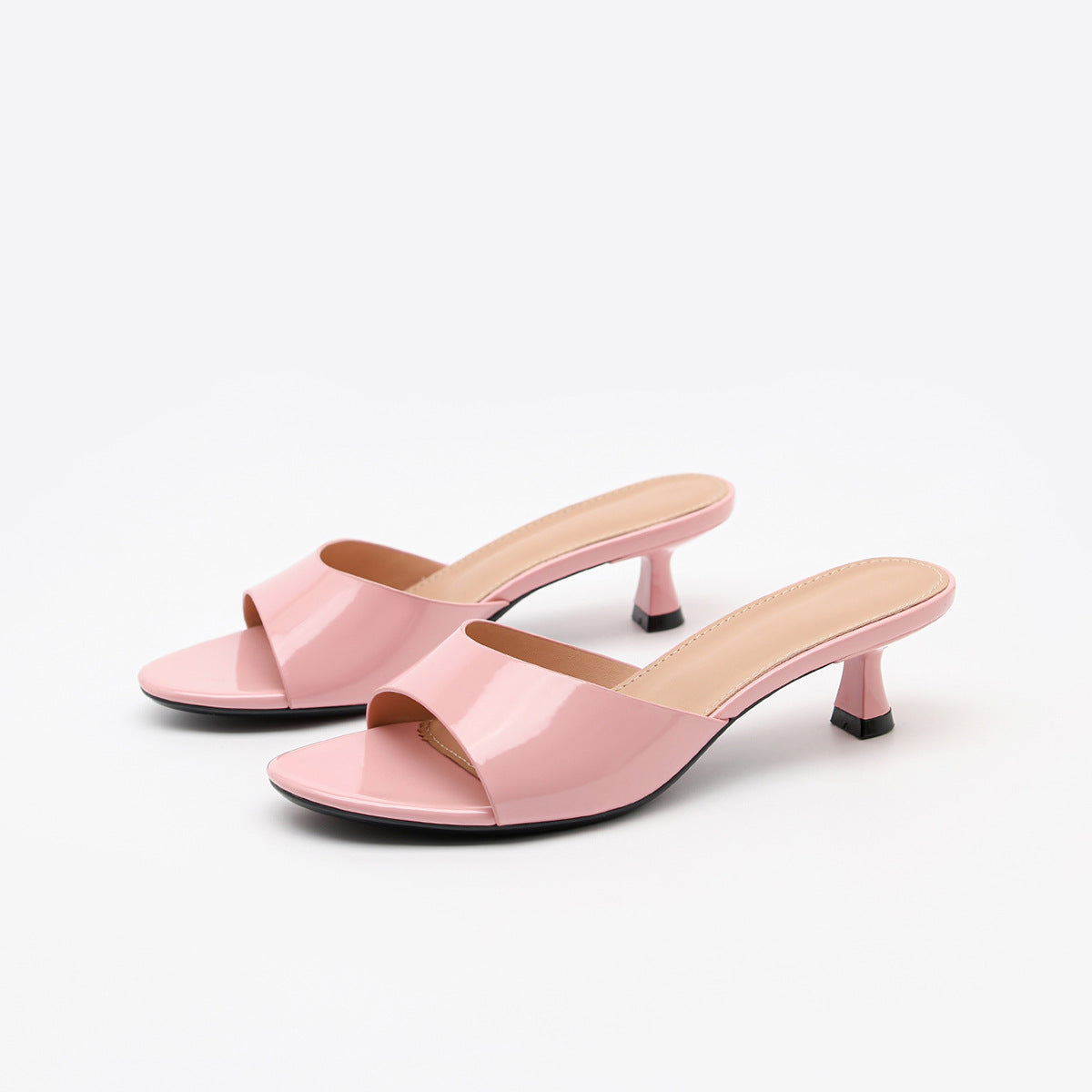 Mescini pink square toe slide kitten heel sandals, angled pair on a white backdrop, US women's sizes