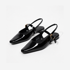 Mescini – Black patent pointed toe mary jane slingbacks, angled studio pair, US women's sizes