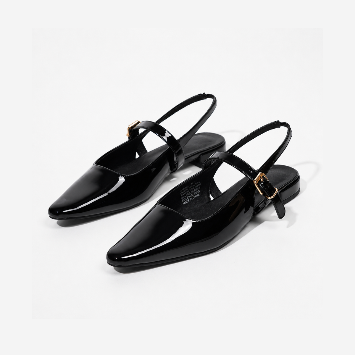 Mescini – Black patent pointed toe mary jane slingbacks, angled studio pair, US women's sizes