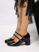 Mescini black Mary Jane block heel shown close up from the outer side, US women's sizes