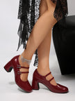Mescini burgundy Mary Jane block heel worn from the side on a pale floor, US women's sizes