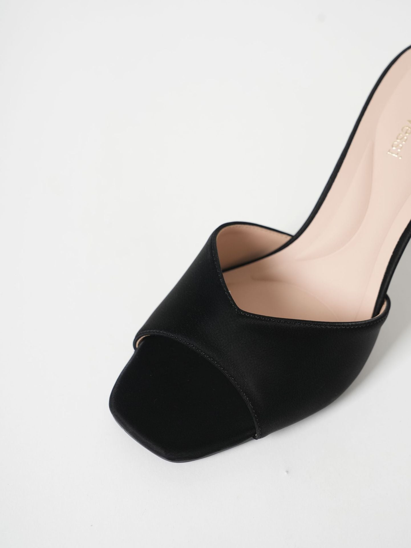 Mescini black square toe stiletto mule, close view of the wide front band, US women's sizes