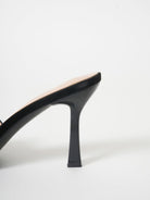 Mescini black wide band square toe mule, close view of the flared stiletto, US women's sizes