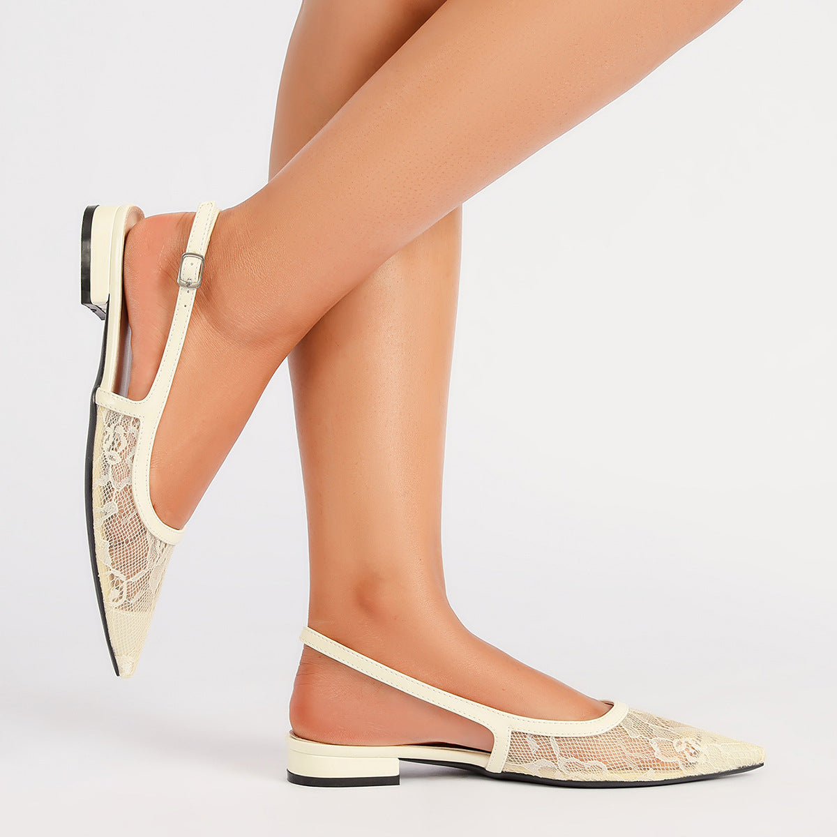 Mescini apricot lace mesh pointed toe slingbacks, worn by a model, one heel lifted, US women's sizes