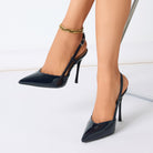 Mescini – navy blue slingback stiletto heels worn with a gold anklet, US women's sizes