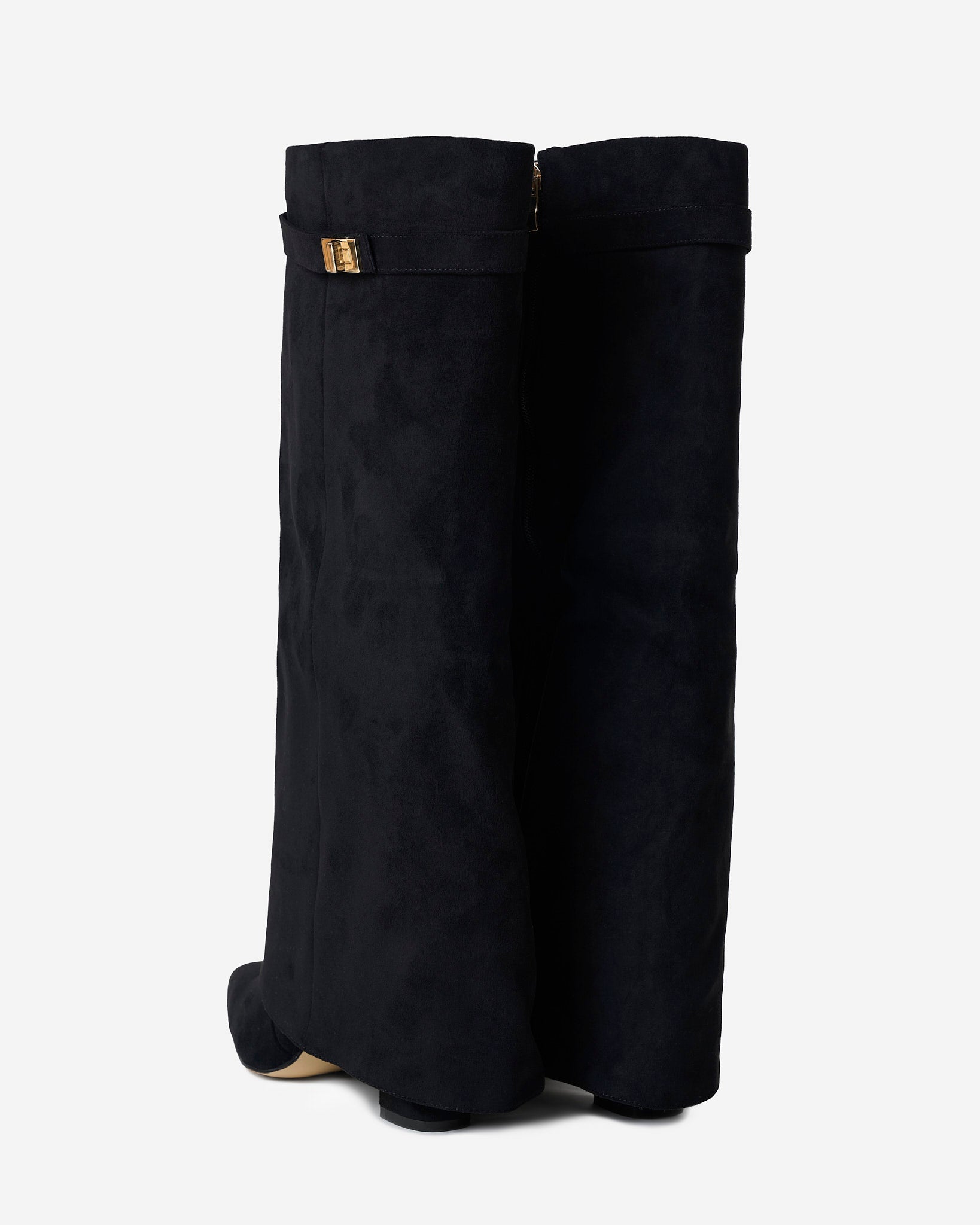 Mescini black fold over knee high boots, worn by a model seated on a bench, US sizes