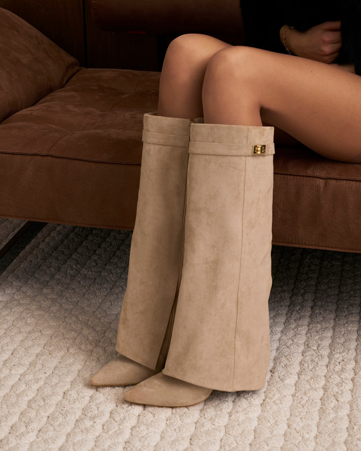 Mescini beige fold over knee high boots, angled pair view on a pale floor, US sizes