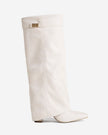 Mescini cream fold over knee high boots, full side view on a studio backdrop, US sizes