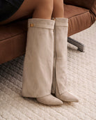 Mescini taupe fold over knee high boots, angled pair view on a pale floor, US sizes