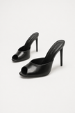 Mescini black sculpted peep toe stiletto mules, angled pair on a pale studio backdrop, US women's sizes
