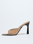 Mescini nude square open toe stiletto mules, single shoe seen from the side, US women's sizes