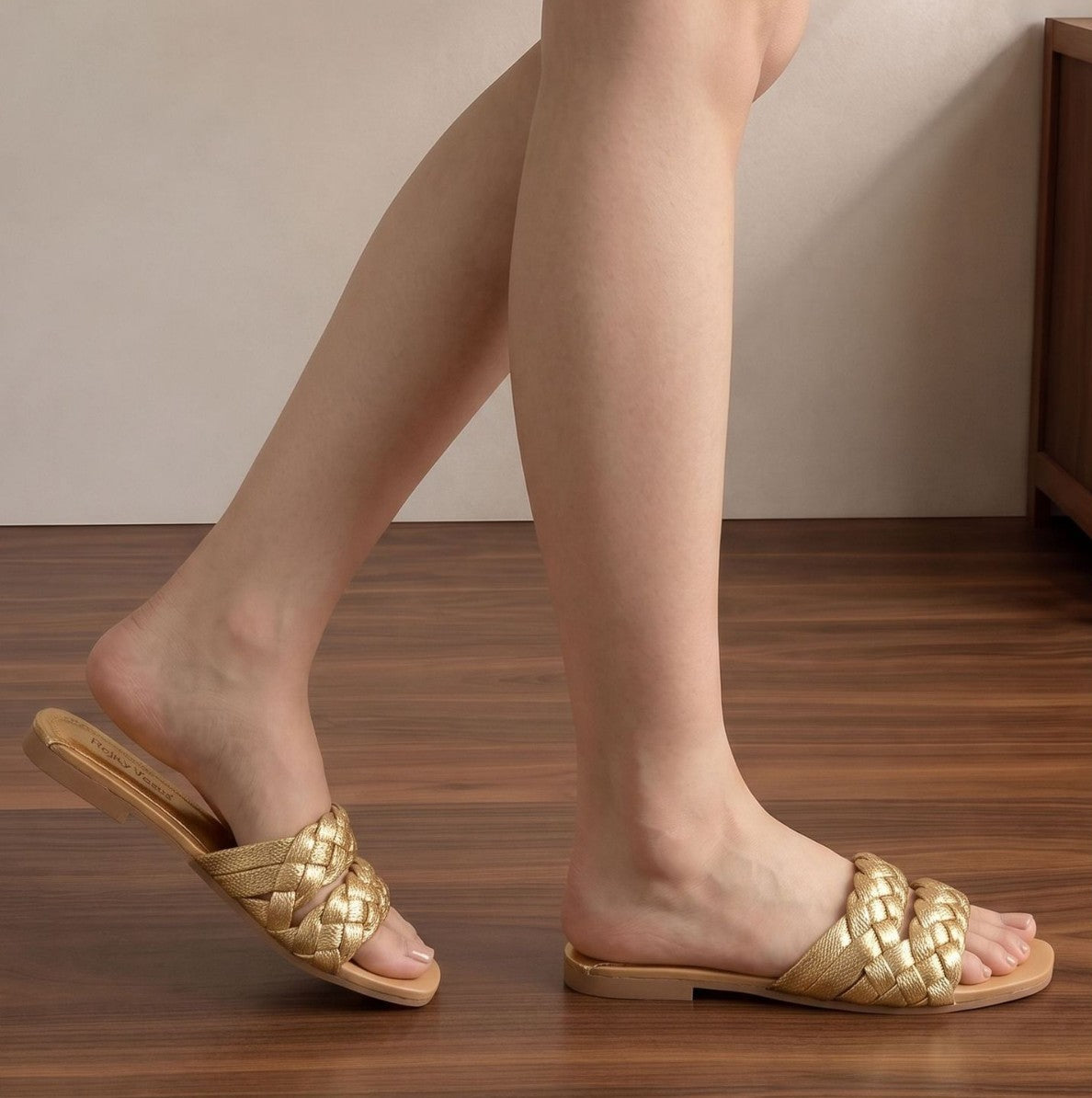 Mescini - gold braided slides worn walking, thin sole edge shown, US women's sizes