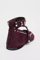 Mescini burgundy studded ankle strap mary jane flats seen from behind at an angle, US women's sizes