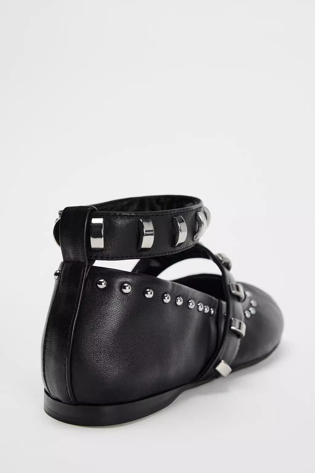Mescini black studded ankle strap mary jane flats, back view of the heel cup, US women's sizes
