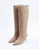Mescini beige suede knee high boots, angled pair view on a pale floor, US size guide