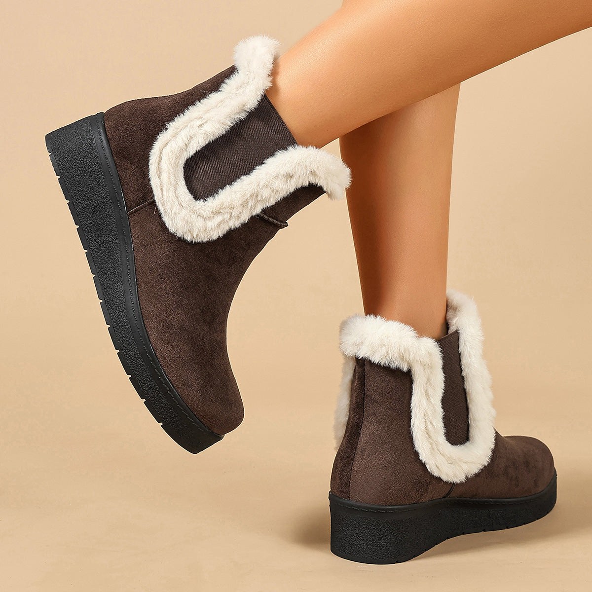 Mescini brown fur trim wedge winter ankle boots, worn with one leg raised, sole shown, US women's sizes