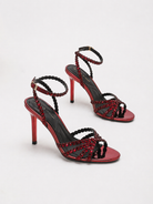 Mescini red rhinestone strappy stiletto sandals, the pair angled on a light background, US women's sizes